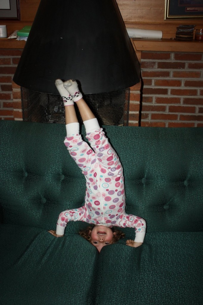 Mikayla Doing a Headstand