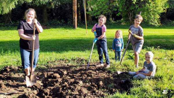 Christina preparing the soil with Mikayla, Julia, Timothy, and Nathaniel Christina preparing the soil with Mikayla, Julia, Timothy, and Nathaniel