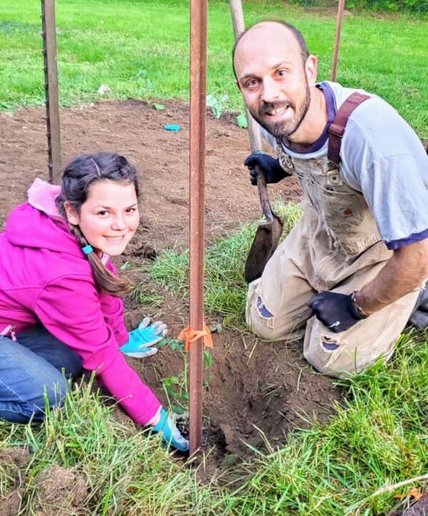 Mikayla and James planting tomatoes Mikayla and James planting tomatoes